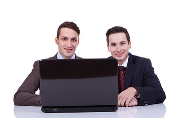 Image showing Two business men at a desk