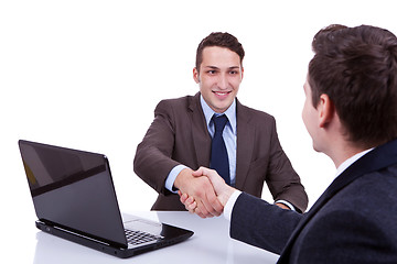 Image showing  business men reaching to an agreement 