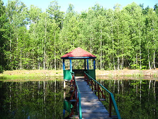 Image showing summerhouse in picturesque place with river