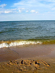 Image showing Marine waves and inscription