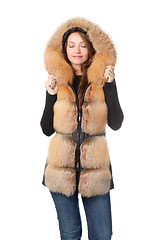 Image showing Beautiful woman in fur trimmed jacket