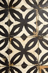 Image showing Antique floor tiles abraded backdrop in corridor.