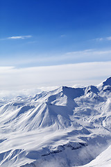 Image showing Snowy mountains in sunny day