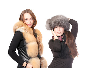 Image showing Two attractive women dressed for winter