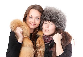 Image showing Two attractive women dressed for winter