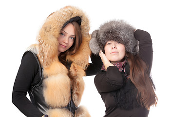 Image showing Two attractive women dressed for winter