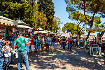 Image showing 16. Jul 2012 - Street vendor selling tourist souvenirs. Most vendors in Venice aren't of Italian origin. 