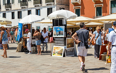 Image showing 16. Jul 2012 - Street vendor selling tourist souvenirs. Most vendors in Venice aren't of Italian origin. 