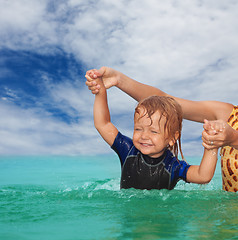 Image showing Kid swimming exercises