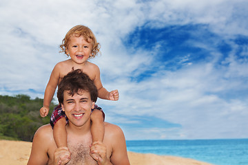 Image showing Dad and son on seaside