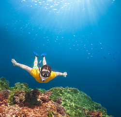 Image showing Young explorer snorkeling underwater