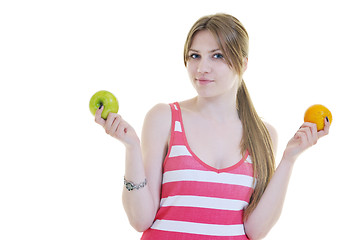 Image showing happy  young  woman eat apple isolated  on white