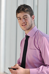 Image showing young business man talk by cellphone