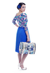 Image showing pinup retro  woman with travel bag isolated