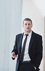 Image showing young business man talk by cellphone