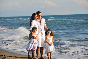 Image showing happy young  family have fun on beach