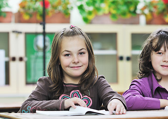 Image showing happy child  in schoold have fun and learning leassos