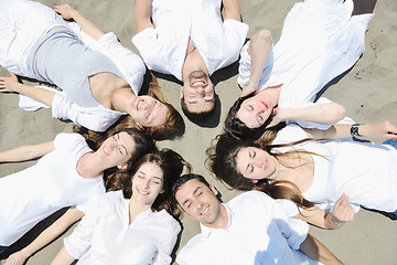 Image showing Group of happy young people in have fun at beach