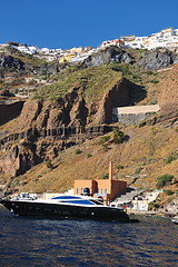 Image showing santorini island coast with luxury yacht