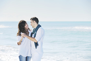 Image showing happy young couple have fun at beautiful beach