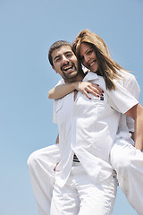 Image showing happy young couple have fun on beach