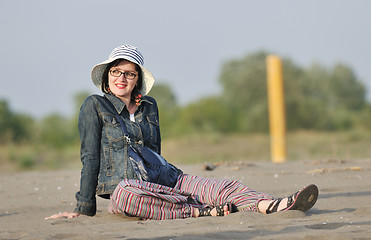 Image showing happy young woman on beach