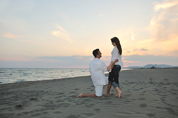 Image showing happy young couple have fun on beach