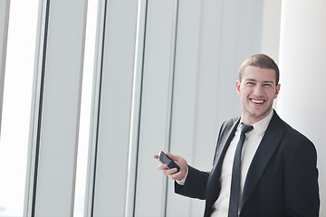 Image showing young business man talk by cellphone