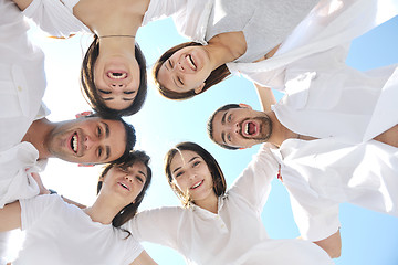 Image showing Group of happy young people in have fun at beach