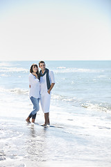 Image showing happy young couple have fun at beautiful beach