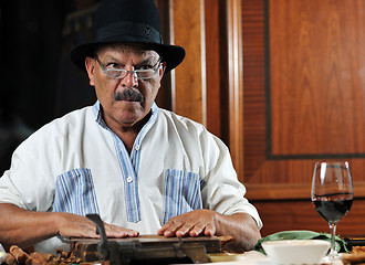 Image showing man making luxury handmade cuban cigare