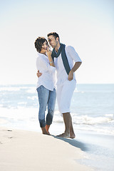 Image showing happy young couple have fun at beautiful beach