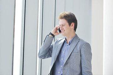 Image showing young business man talk by cellphone