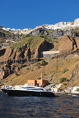 Image showing santorini island coast with luxury yacht