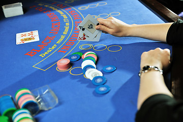 Image showing woman play black jack card game in casino