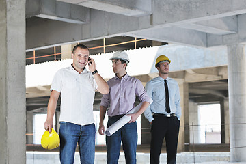 Image showing Team of architects on construciton site