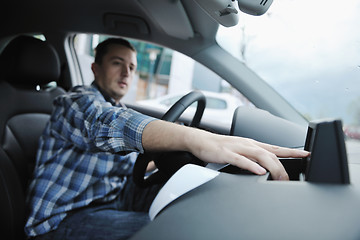 Image showing man using car navigation