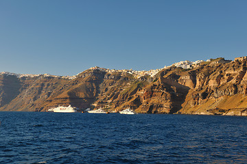Image showing santorini island coast with luxury yacht