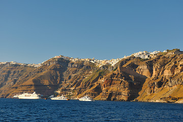 Image showing santorini island coast with luxury yacht