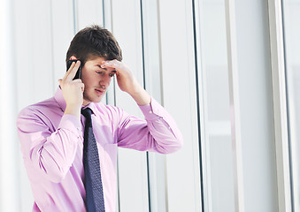 Image showing young business man talk by cellphone