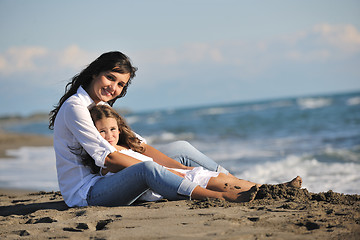 Image showing mom and daughter portrait on beach