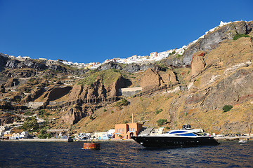 Image showing santorini island coast with luxury yacht