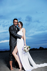 Image showing romantic beach wedding at sunset