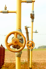 Image showing Natural gas station among field