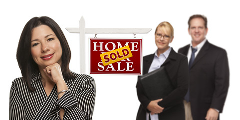 Image showing Mixed Race People with Sold Real Estate Sign Isolated