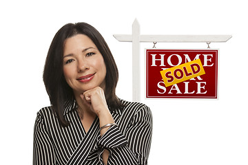 Image showing Woman and Sold Home For Sale Real Estate Sign Isolated