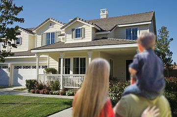 Image showing Young Family Looking at a New Home