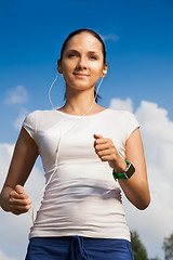 Image showing confident runner with headphones