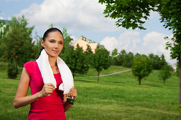 Image showing nice girl jogging in the park