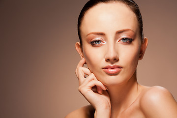 Image showing enigmatic woman on chocolate background